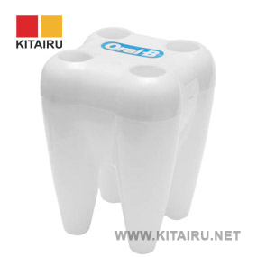 tooth shaped plastic pen holder Oral-B