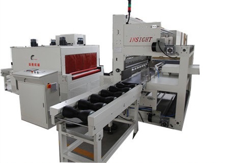 Heat shrinkable film packaging machine for cylinder product