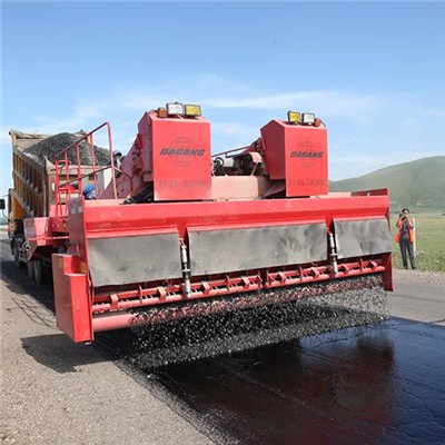 Computer Controlled Self Propelled Chip Spreader Is Designed And Constructed To Apply Many Different Size Aggregates At Different Speeds.