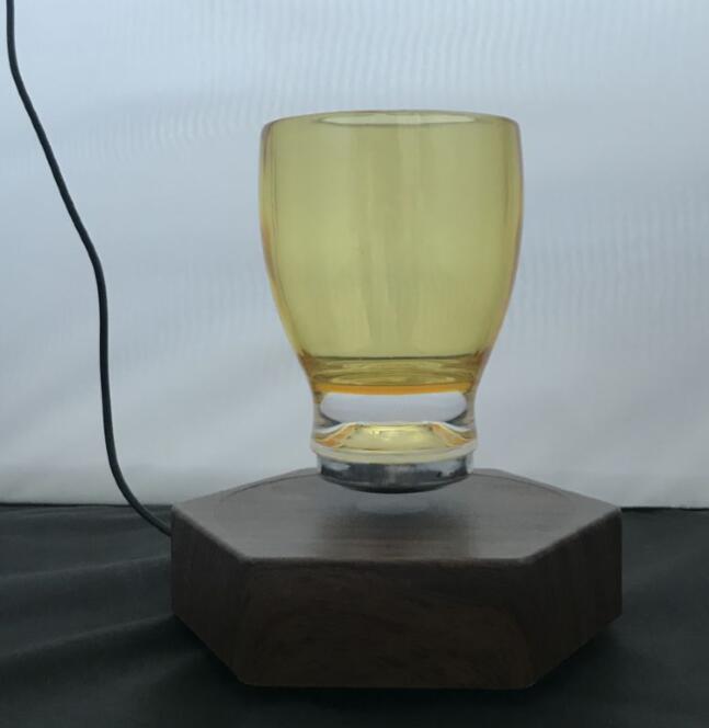 magnetic floating levitate bottom cup 