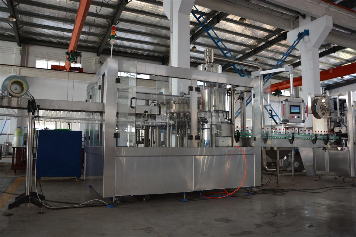AUTOMATIC CARBONATED SOFT DRINK (CSD) BOTTLING MACHINE