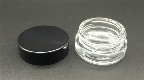 China Factory price cosmetic round jar screw neck press  glass bottle 7G manufacture