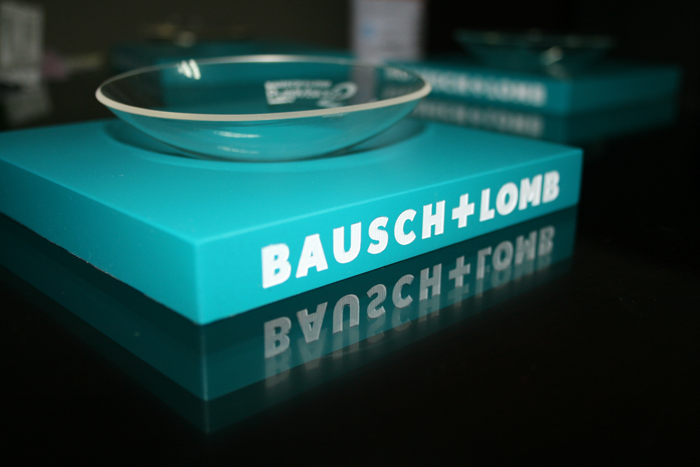 Promotion money tray Bausch+Lomb