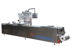 Fully automatic continuous tension vacuum packaging machine