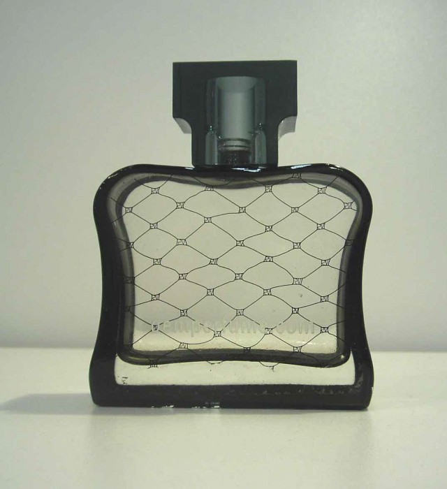 black print perfume bottles glass material