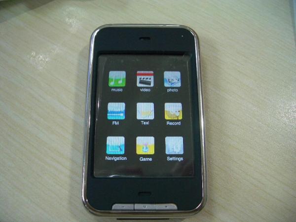 FT 281 with touch screen and iPhone figure