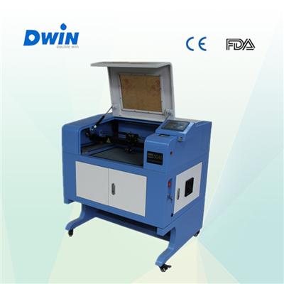 CNC CO2 laser cutting machine with sealed CO2 laser tube CE/FDA certificate