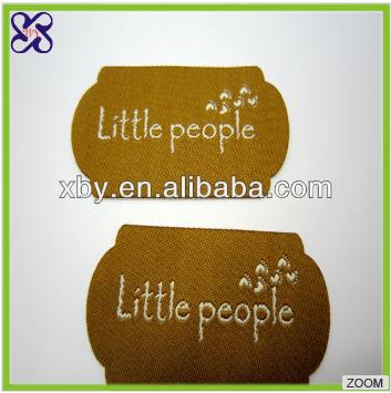 Wholesale garment label for clothing,  sandy texture, cheap price, quick turn around time