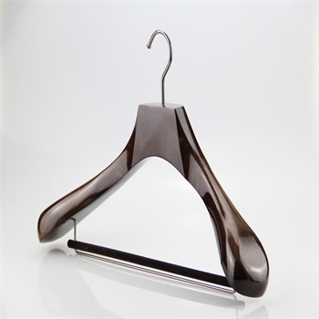   Shiny brown wooden suit hanger with locking bar