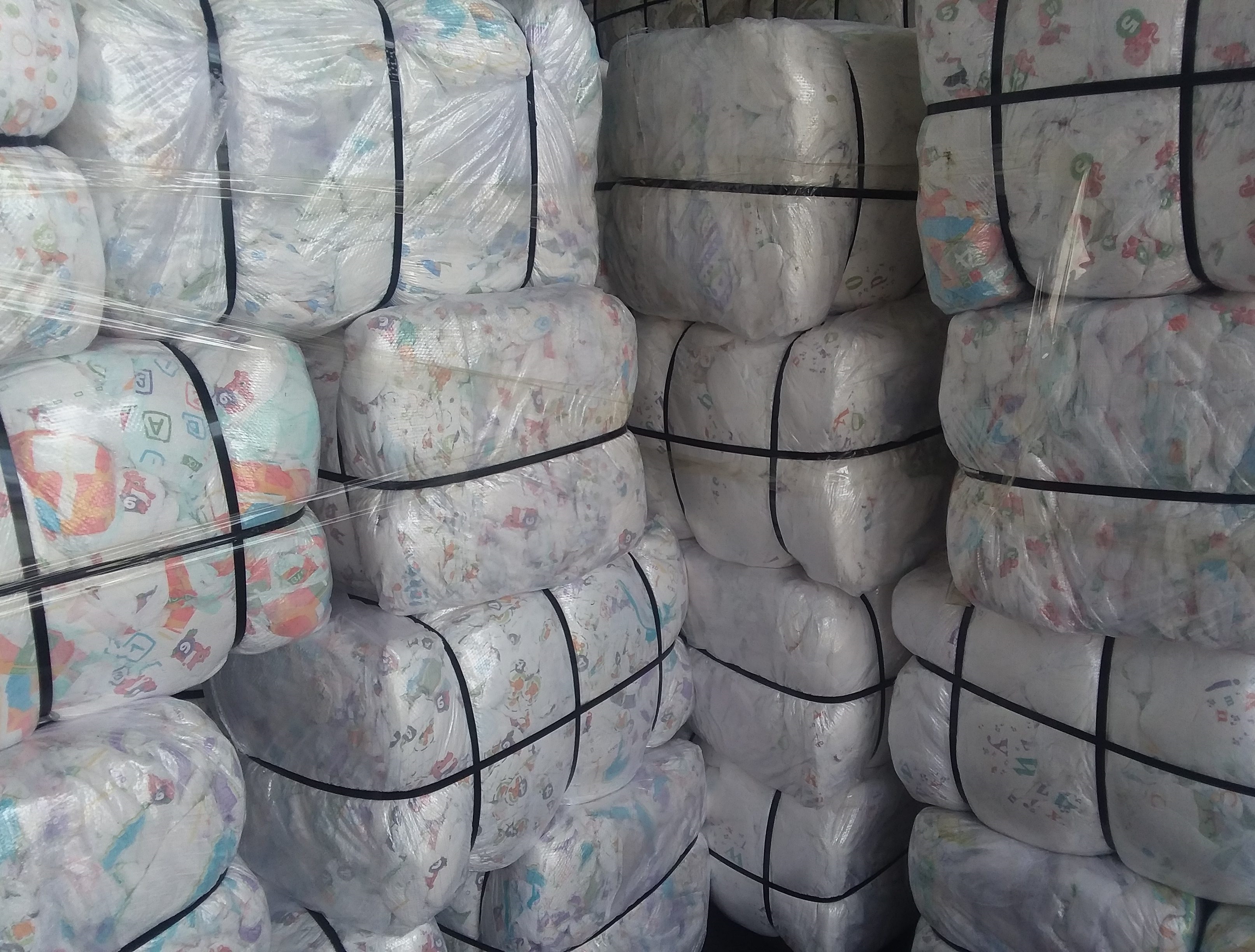 Baby diapers in bales
