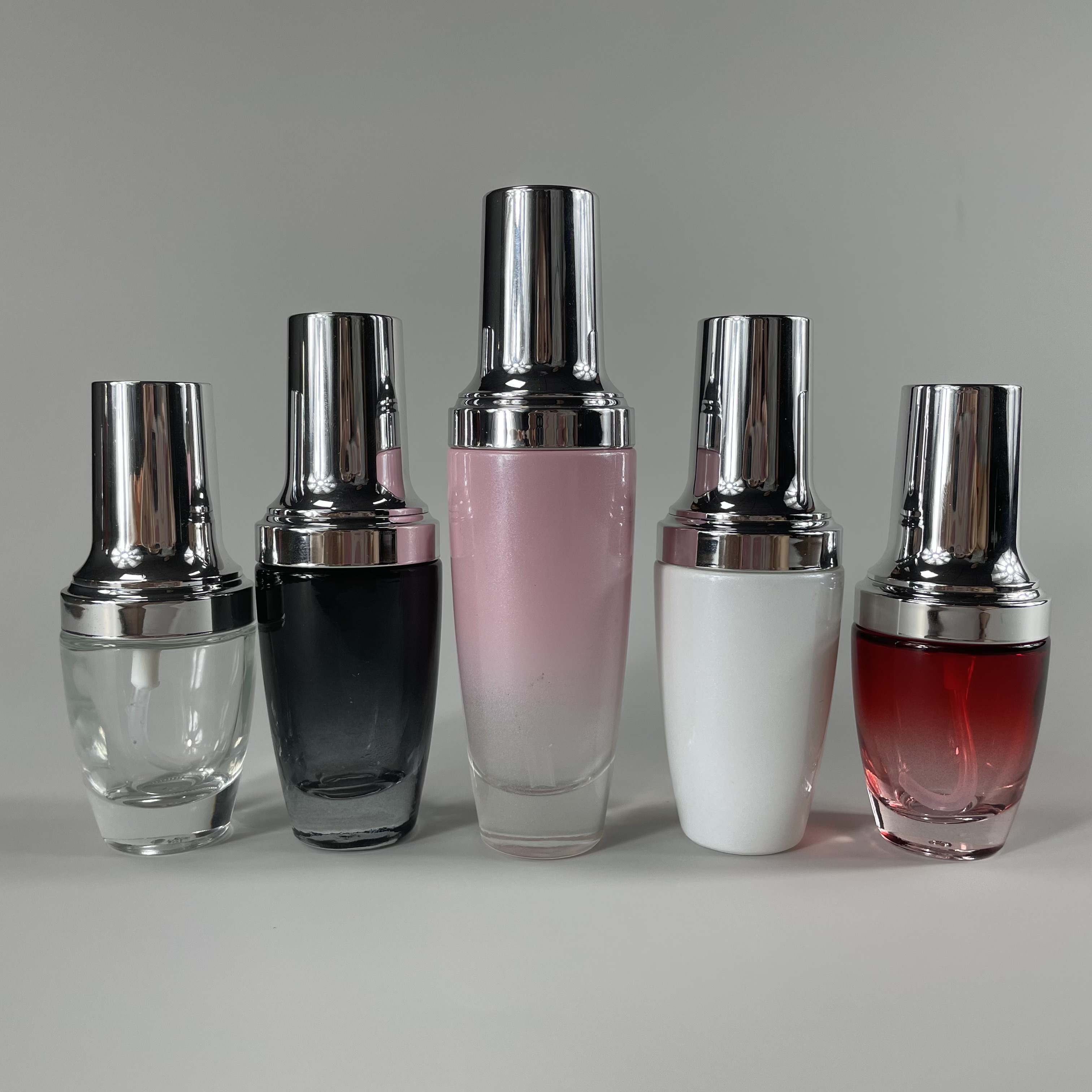 Colored glass perfume bottle 30ml 50ml 100ml cylinder glass toner bottle with sprayer lotion glass bottle