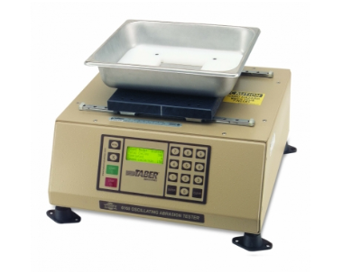 Taber oscillation and wear instrument