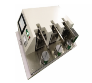 Moisture friction and wear testing machine ASTM G65